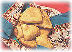 Sopapillas (or sopaipillas) are one of the most delightful and tasty Mexican food treats!